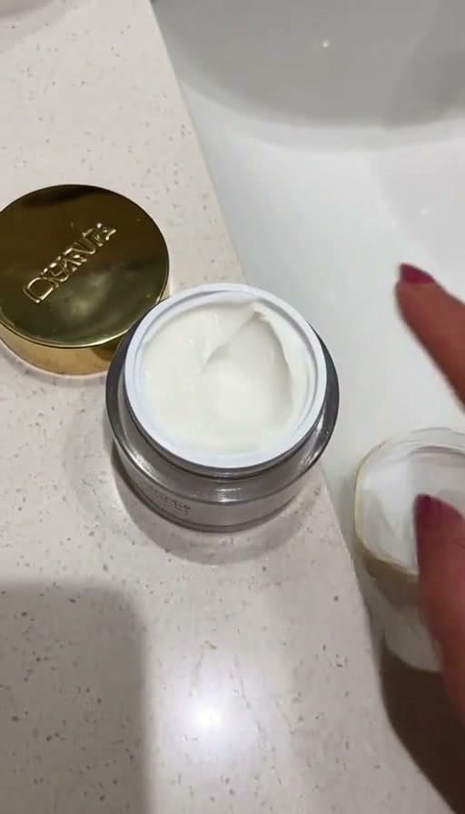 Preview of Moisturizer scooped from a jar with one finger