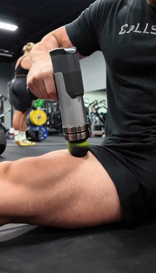 Preview of Massage gun run slowly along the thigh